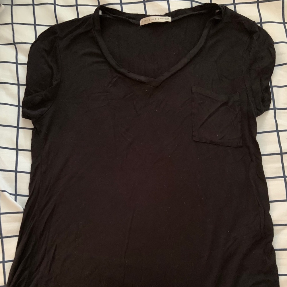 Black V-neck tee with front pocket